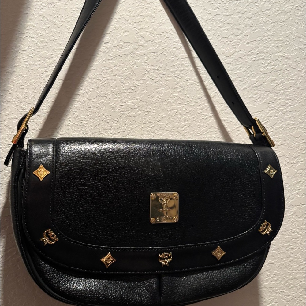 MCM Black and Gold Shoulder Bag with Flap Closure